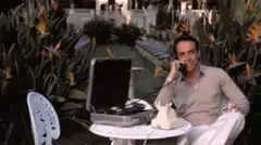 Tom Hanks laughing on the phone