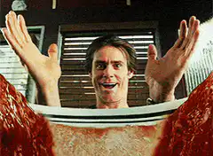 Jim Carrey as Bruce Nolan with soup breasts