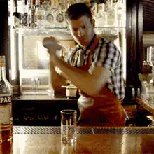 bartender shaking cocktail