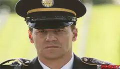 Officer Saluting with Serious Face