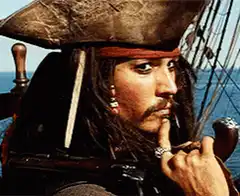 Jack Sparrow thinking then smiling