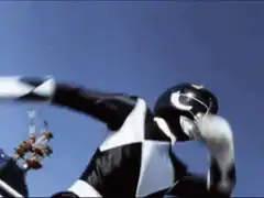 Black Ranger throws sword at Mammothzord