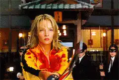 Beatrix Kiddo stands surrounded by Yakuza