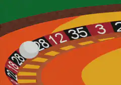 Roulette ball spinning on wheel