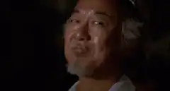 Seiji Takaiwa smirking