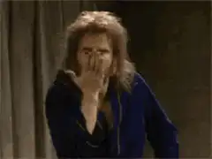 Jeff Bridges winking and blowing a kiss