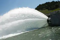 Water gushing from dam spillway