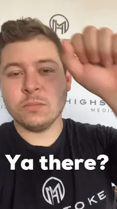 Man asking Ya there with hand gestures