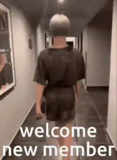 woman walking down hallway welcome new member