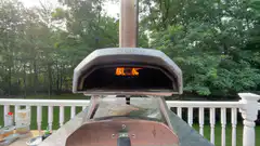 Ooni pizza oven on a deck