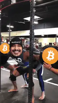 Man lifting weights with Bitcoin emojis