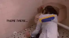 woman scrubbing toilet with brush