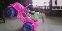 Toddler flips pink toy jeep