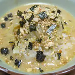Bowl of rice porridge with toppings