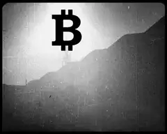 Bitcoin symbol over mountain landscape