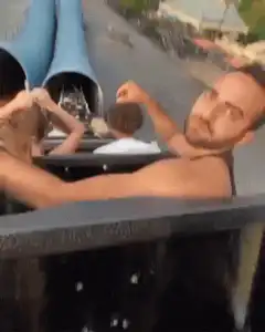 Man on roller coaster then swing