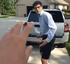 Guy drawing 4x4 on car