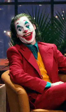 Joker laughing in chair