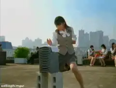 girl headbutts parking meter