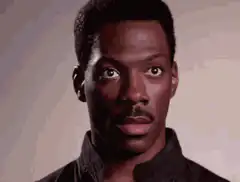 Eddie Murphy wide eyes hand wave