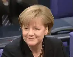 Angela Merkel smirking