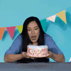 Woman smashes face into birthday cake