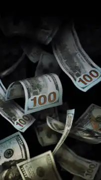 100 dollar bills falling