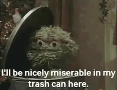 Oscar the Grouch in trash can