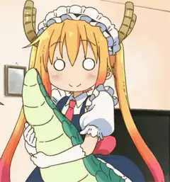 Tohru holding a dragon pillow