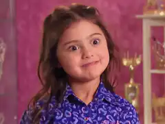 Girl makes a smug face
