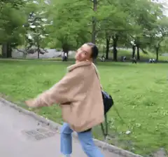 woman dancing in park
