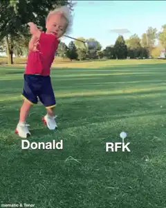 Toddler swings golf club and falls over
