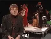 Elvis Costello reacting to a performance