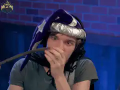 Wizard blows blue magic from wand
