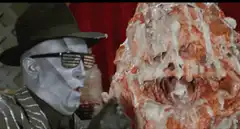 Mr. Freeze kisses a meatloaf