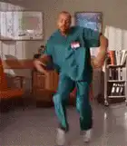 Dr. Cox dancing in scrubs