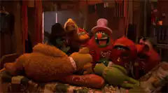 Muppets watching Kermit sleep