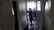 Soldier kicks open door and enters room