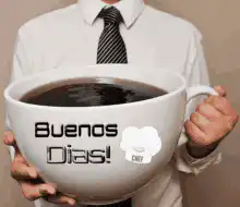Man holding giant coffee cup Buenos Dias