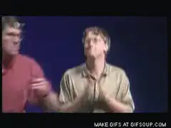 Bill Gates clapping and smiling