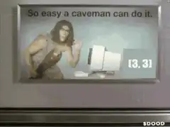 Caveman looks at computer ad