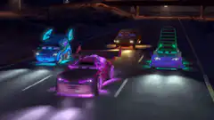 Cars drifting on a highway at night