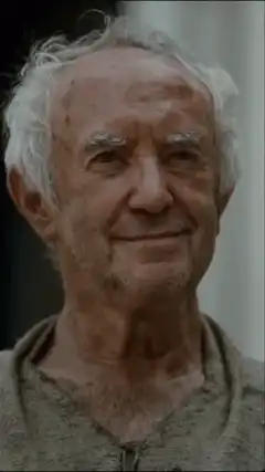 Old man smirking