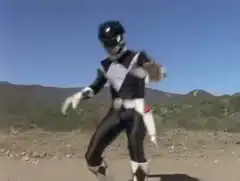 Black Ranger doing a silly dance