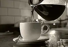 pouring coffee into a cup