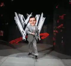 Man in suit dancing on stage