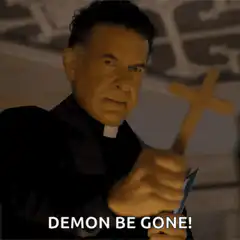 Priest holding cross demon be gone