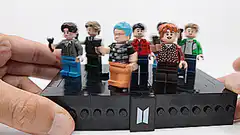 BTS Lego figures spinning on a turntable