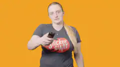 Woman holding phone with MUTED text