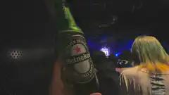 Heineken beer bottle at concert